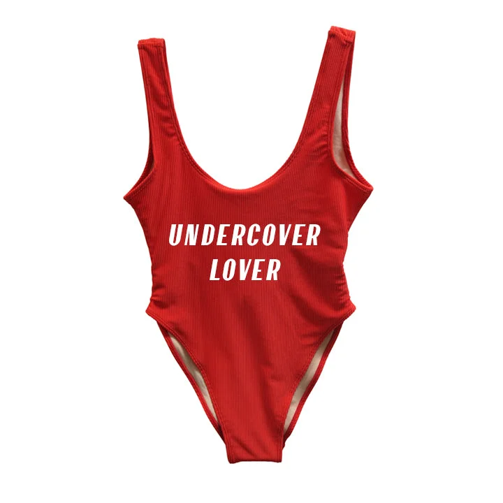 Women's Long - Length One - Pieces in Gray with Asymmetric Hem for a Contemporary and Fashionable LookUNDERCOVER LOVER [SWIMSUIT]