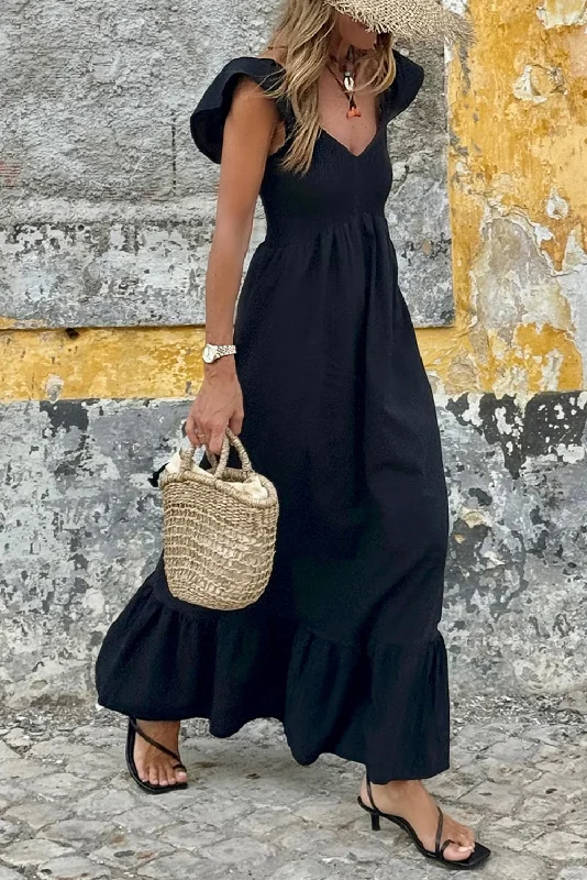 Maxi - inspired midi dresses with flowing fabrics for a beachy vibe Black V Neck Flutter Sleeve Smocked Bodice High Waist Ruffle Maxi Dress Maxi - inspired midi dresses with flowing fabrics for a beachy vibe Black V Neck Flutter Sleeve Smocked Bodice High Waist Ruffle Maxi Dress