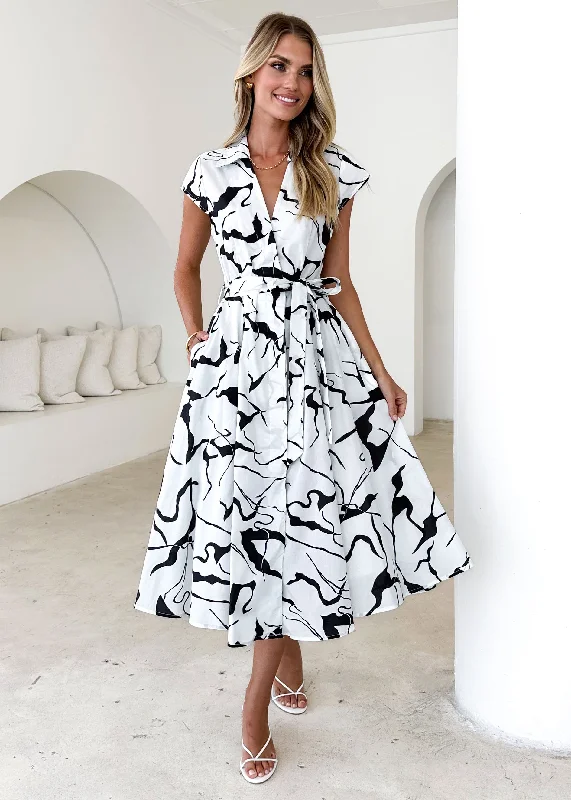Midi dresses with pleated skirts for a timeless and elegant appeal Cofield Midi Dress - Black Swirl Midi dresses with pleated skirts for a timeless and elegant appeal Cofield Midi Dress - Black Swirl