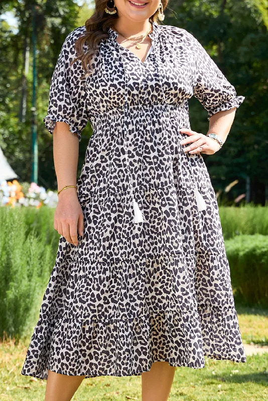 Midi dresses with geometric cutouts for a contemporary and edgy look Plus Size Leopard Tassel Short Sleeve Dress Midi dresses with geometric cutouts for a contemporary and edgy look Plus Size Leopard Tassel Short Sleeve Dress