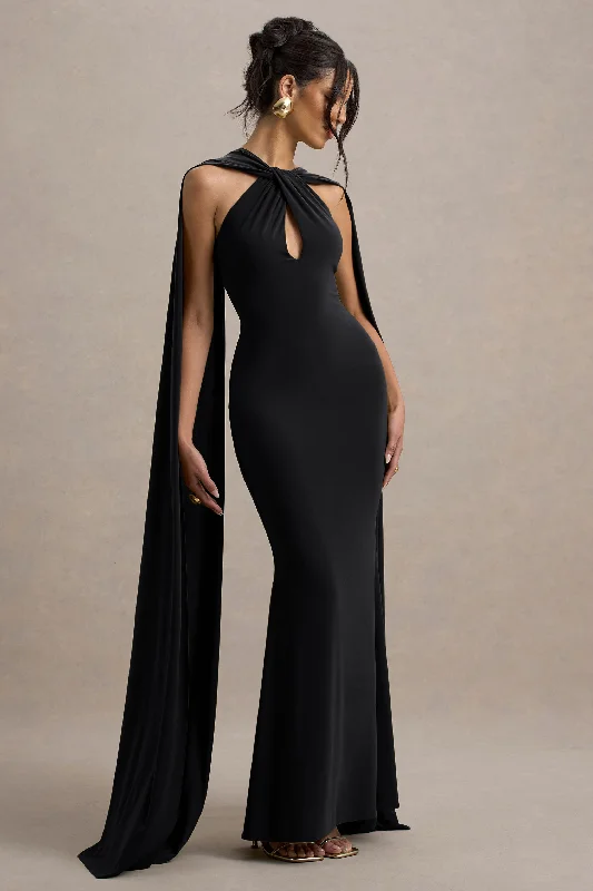 Modern minimalist wedding dresses with clean lines Printed wedding guest dresses with tropical motifs for beach weddings Rhoda | Black Twist Halter-Neck Cape Maxi Dress Modern minimalist wedding dresses with clean lines Printed wedding guest dresses with tropical motifs for beach weddings Rhoda | Black Twist Halter-Neck Cape Maxi Dress