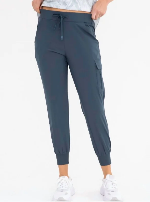 Women's Tight Trousers with Drawstring Waist in Khaki for a Relaxed and Adjustable FitHigh Waisted Capri Joggers In Slate Blue Women's Tight Trousers with Drawstring Waist in Khaki for a Relaxed and Adjustable FitHigh Waisted Capri Joggers In Slate Blue