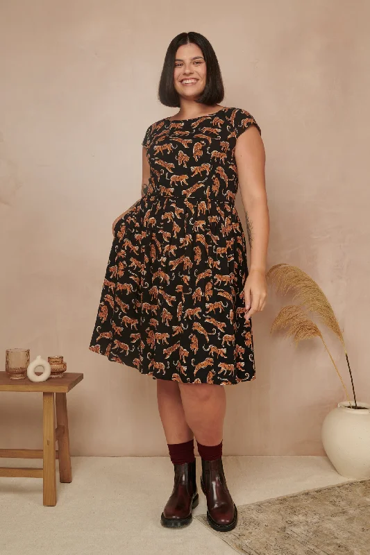 Wrap - Style Women Dress with Adjustable Fit for All Body TypesWrap - Style Women Dress with Adjustable Fit for All Body TypesClaudia Leaping Leopards Dress Wrap - Style Women Dress with Adjustable Fit for All Body TypesWrap - Style Women Dress with Adjustable Fit for All Body TypesClaudia Leaping Leopards Dress