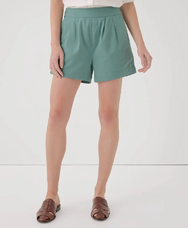 Bermuda Women Shorts for a Classic and Sophisticated LookWomen's Canopy Linen Blend Pleated Short In Blue Spruce Bermuda Women Shorts for a Classic and Sophisticated LookWomen's Canopy Linen Blend Pleated Short In Blue Spruce
